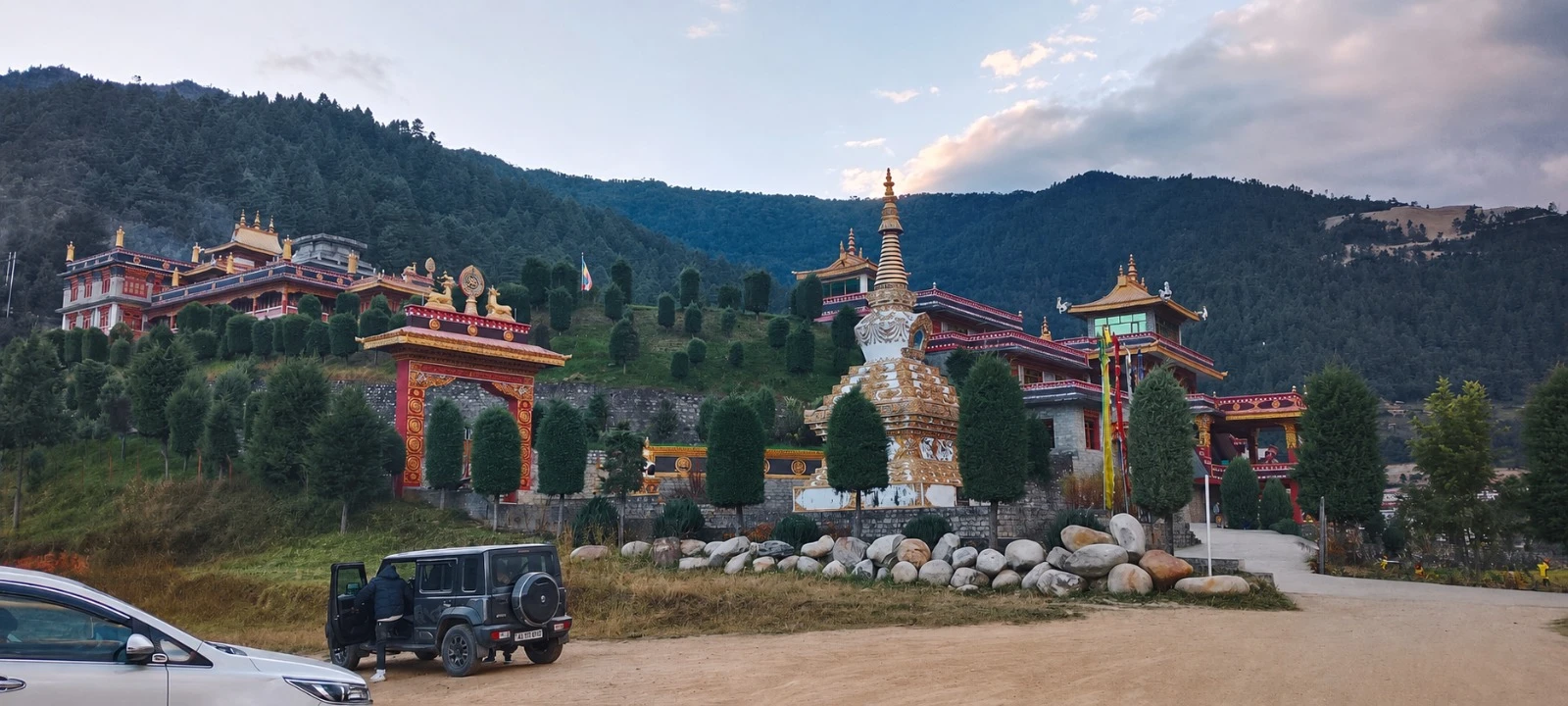 A monastery set among forested mountains in Arunachal Pradesh